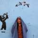 Image for article titled These awesome Afghan guys wore burqas for women’s rights